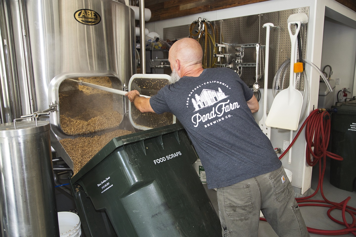 Brewing employee composts grains
